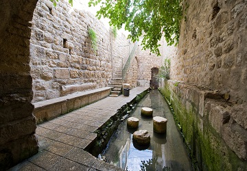 The pool of Siloam at the end of Hezekiah's tunnel is a rock-cut pool on the southern of 'the City David' in Jerusalem