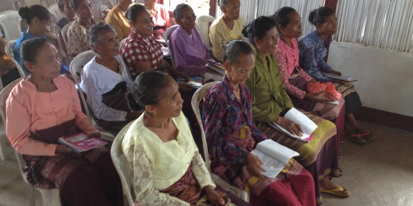 Indonesian women learning to read